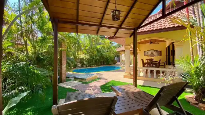 Coconut Paradise Villa garden with coconut trees