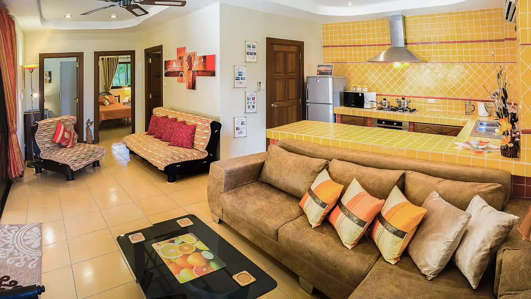 Coconut Paradise Villa lounge with sliding doors to pool