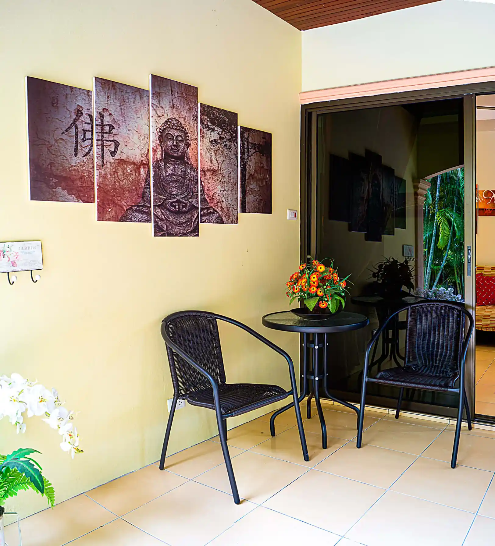 Coconut Paradise Villa patio with garden view