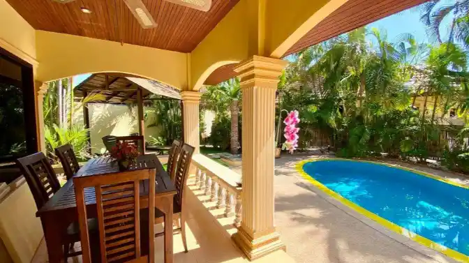 Coconut Paradise Villa patio with ceiling fans