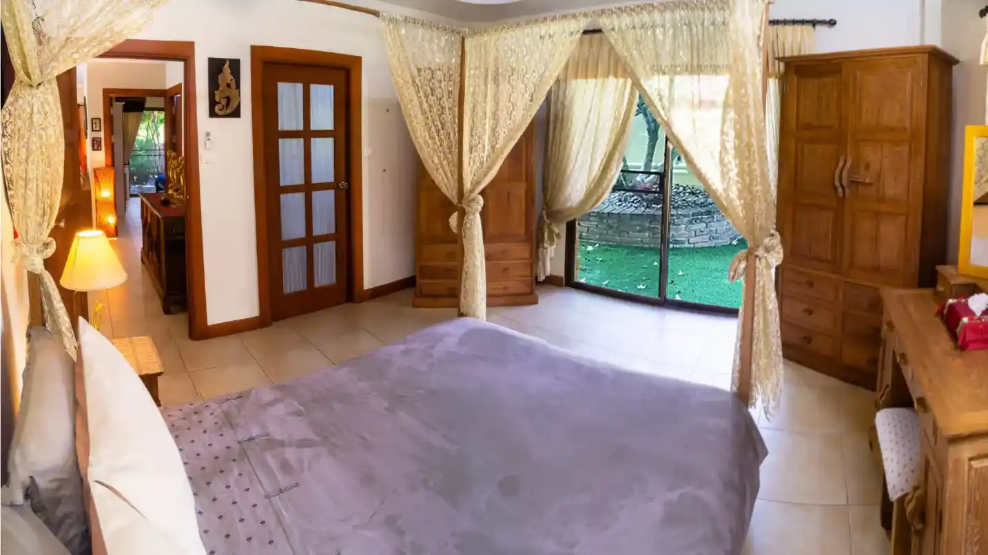 The Coconuts Villa master bedroom with pool view