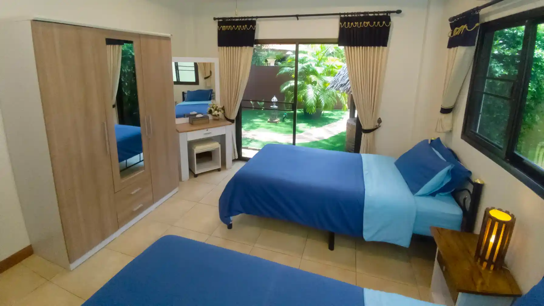 The Coconuts Villa third bedroom with twin beds