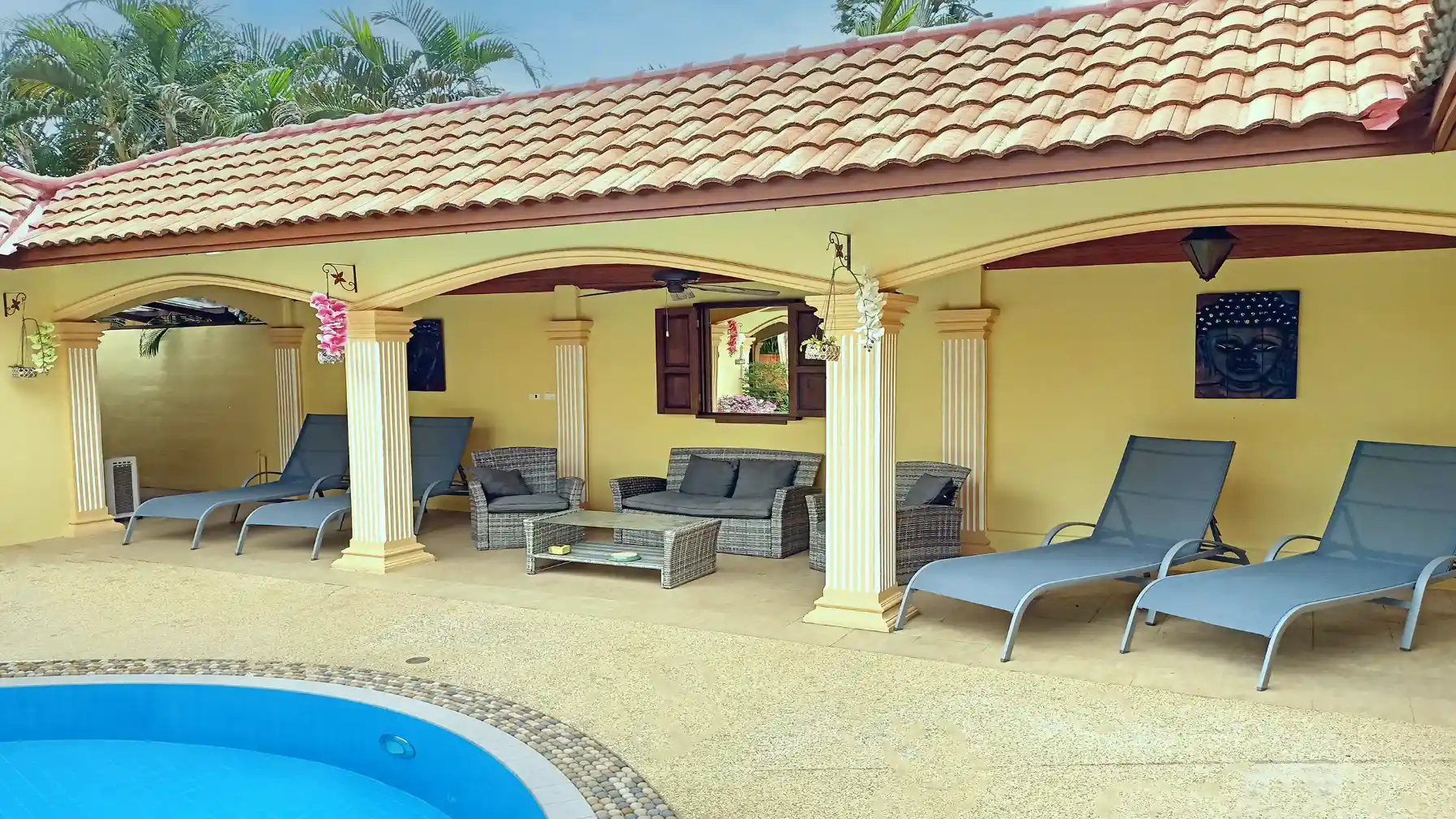 The Coconuts Villa garden and villa exterior