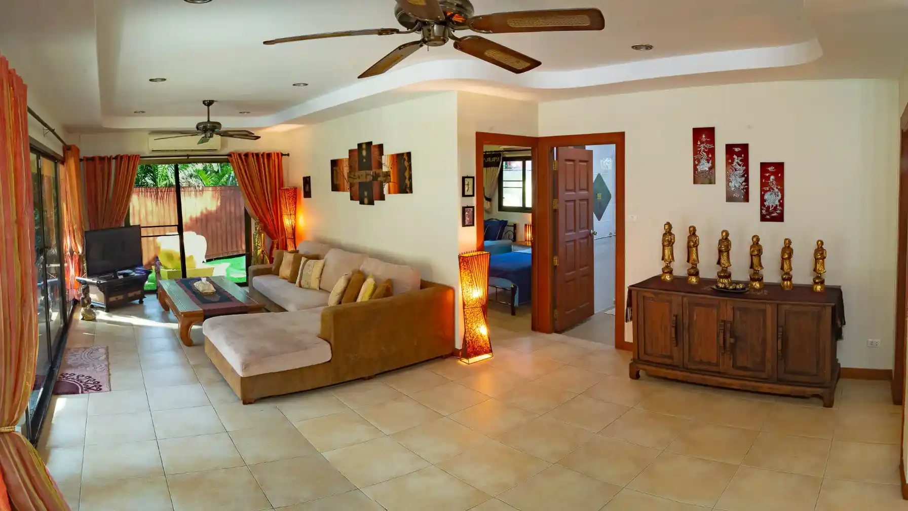 The Coconuts Villa lounge with pool view
