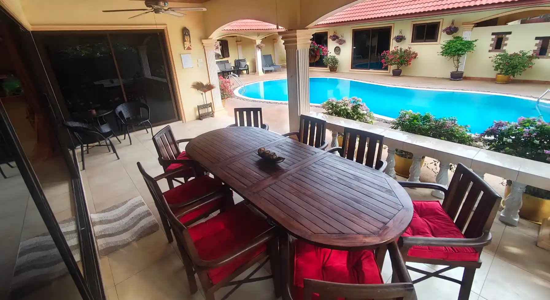 The Coconuts Villa patio with ceiling fans