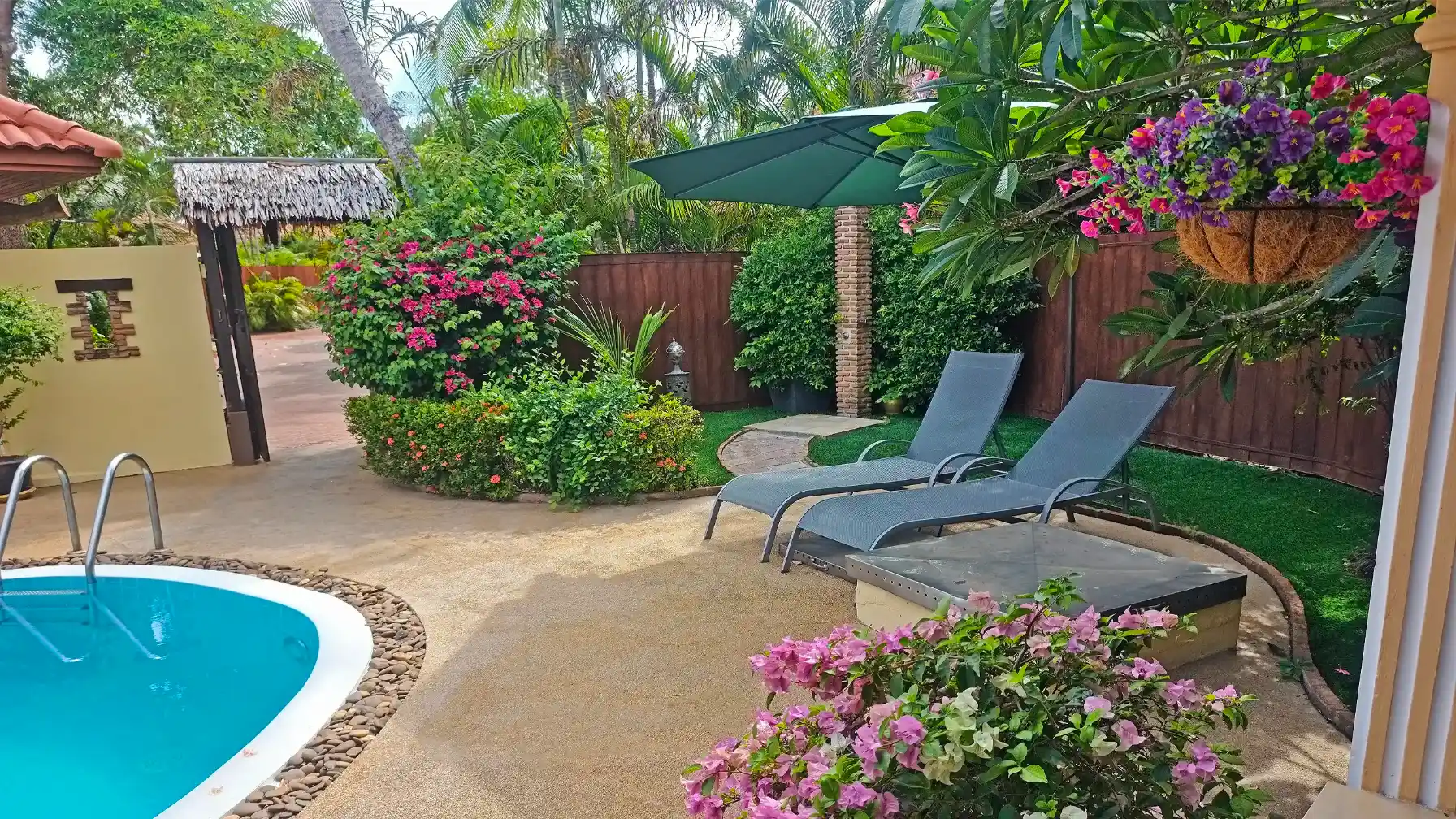 The Coconuts Villa pool and courtyard